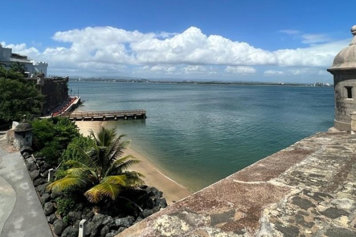 a stone bridge over a body of water