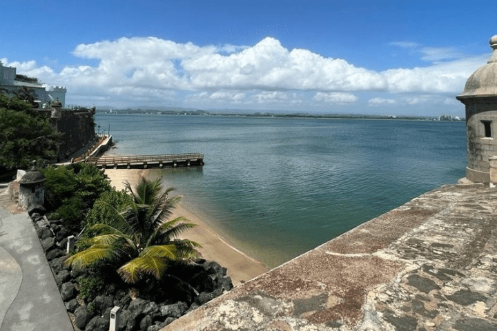 a stone bridge over a body of water